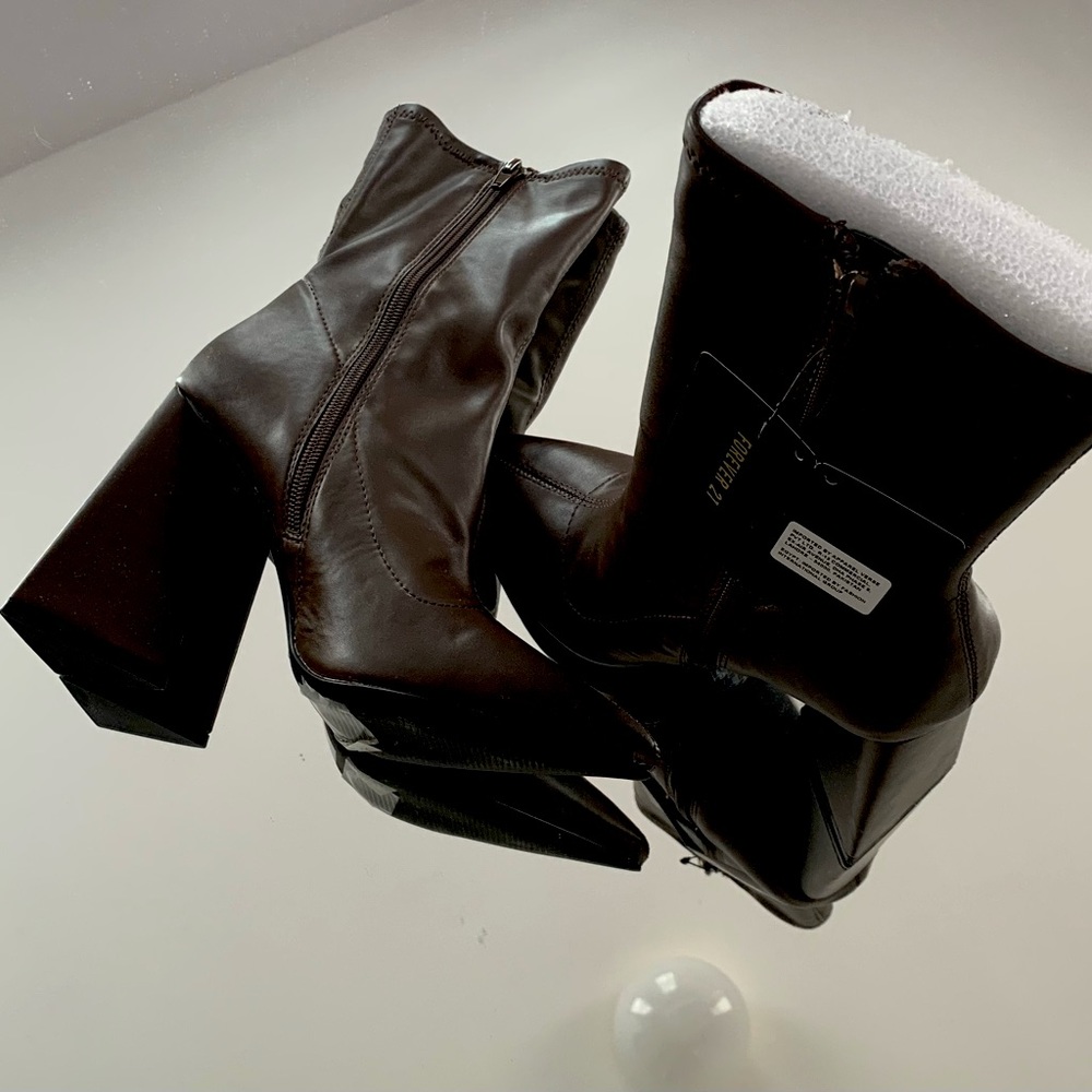 High heel Forever 21 boots, never worn before, tag and foam still attached.